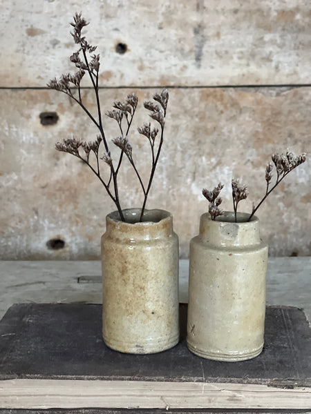 A pair of Vintage French Sand Stoneware Bottles