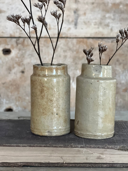 A pair of Vintage French Sand Stoneware Bottles