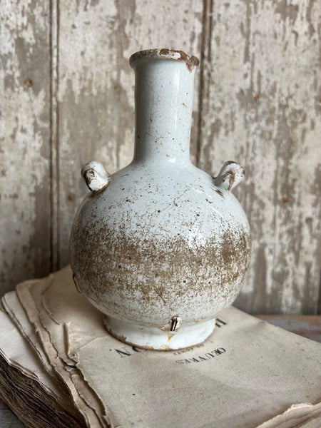 Antique stapled vase