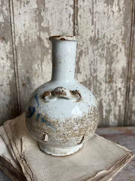 Antique stapled vase