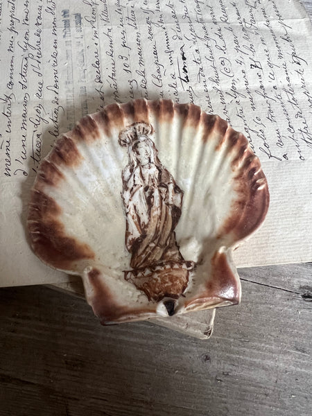 A vintage French painted seashell