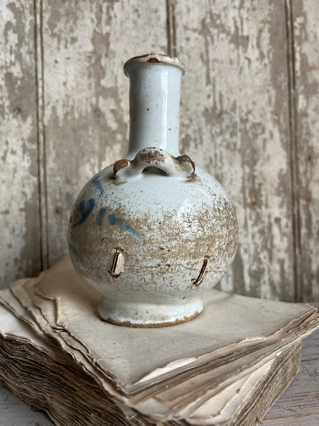 Antique stapled vase