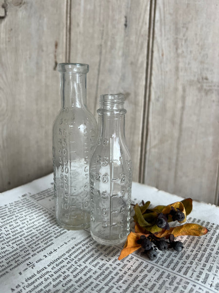 Pair of Sweet French Vintage Measuring Bottle