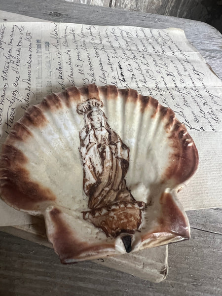 A vintage French painted seashell