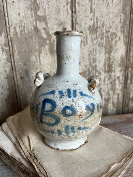 Antique stapled vase