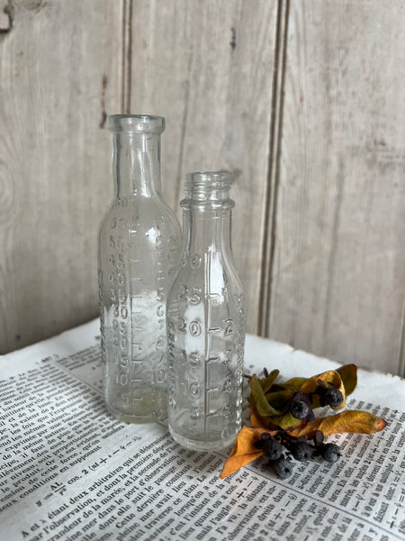 Pair of Sweet French Vintage Measuring Bottle