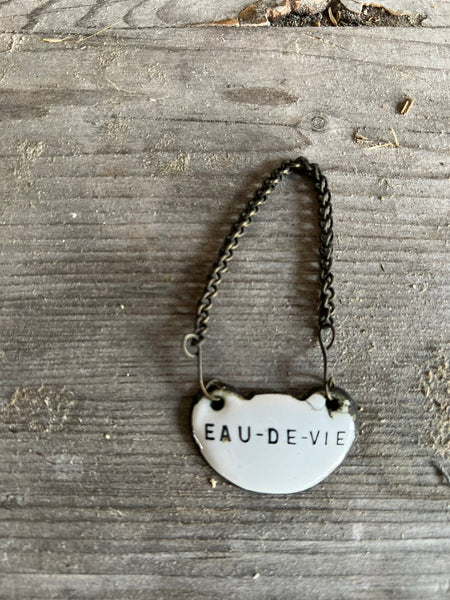 Small Vintage "Eau de Vie" Enamel Tag