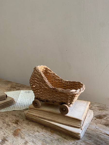 Children's vintage wicker pram