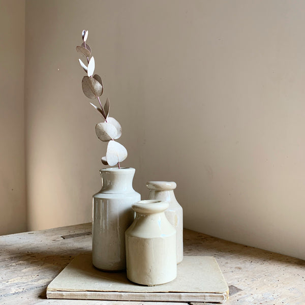 Cluster of Antique Stoneware Bottles