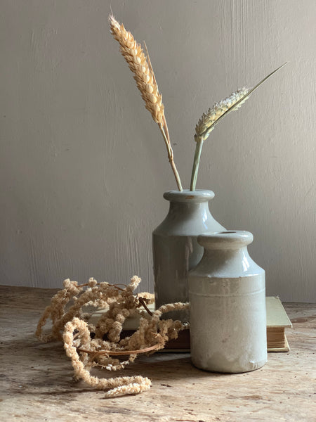 A pair of Vintage French Stoneware Bottle