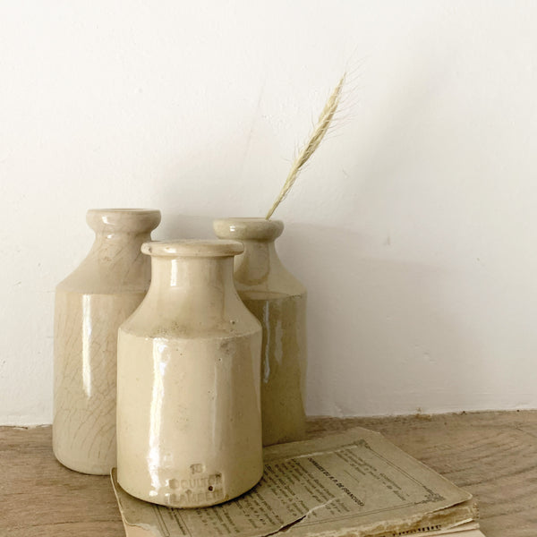 Cluster of Antique Stoneware Bottles